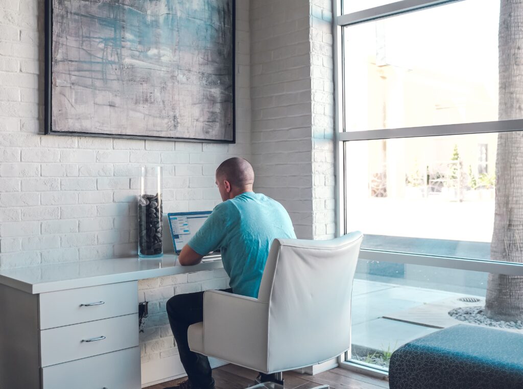 Man at computer using Brigit