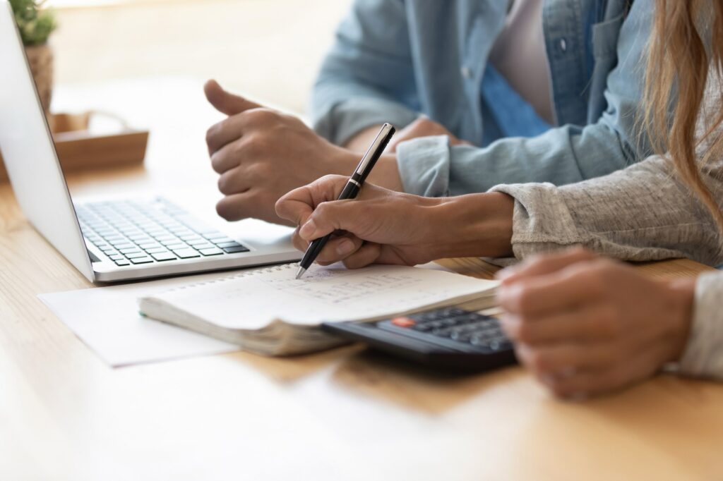 Two people looking at their finances.