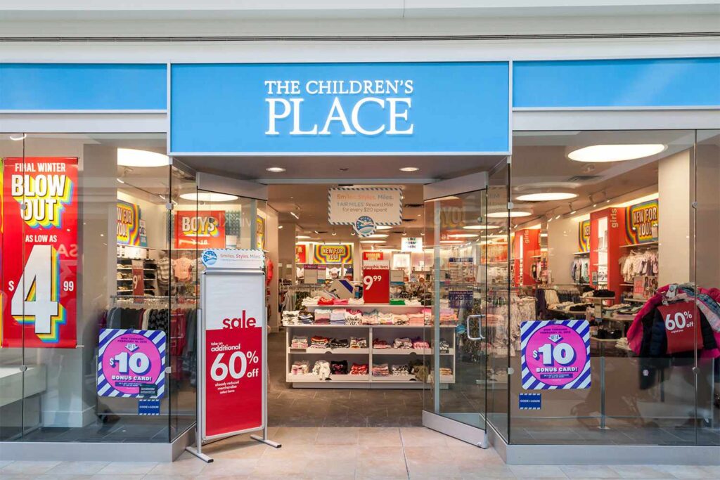 Children's Place credit card. Store front in a mall, shown.