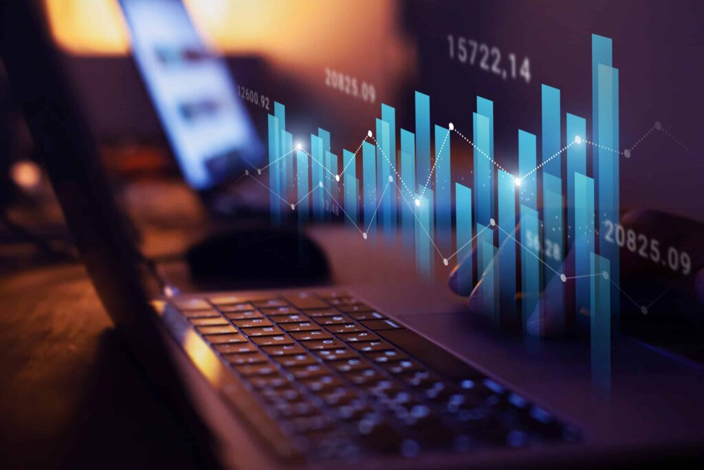 short-term investing, graphs above a computer screen.