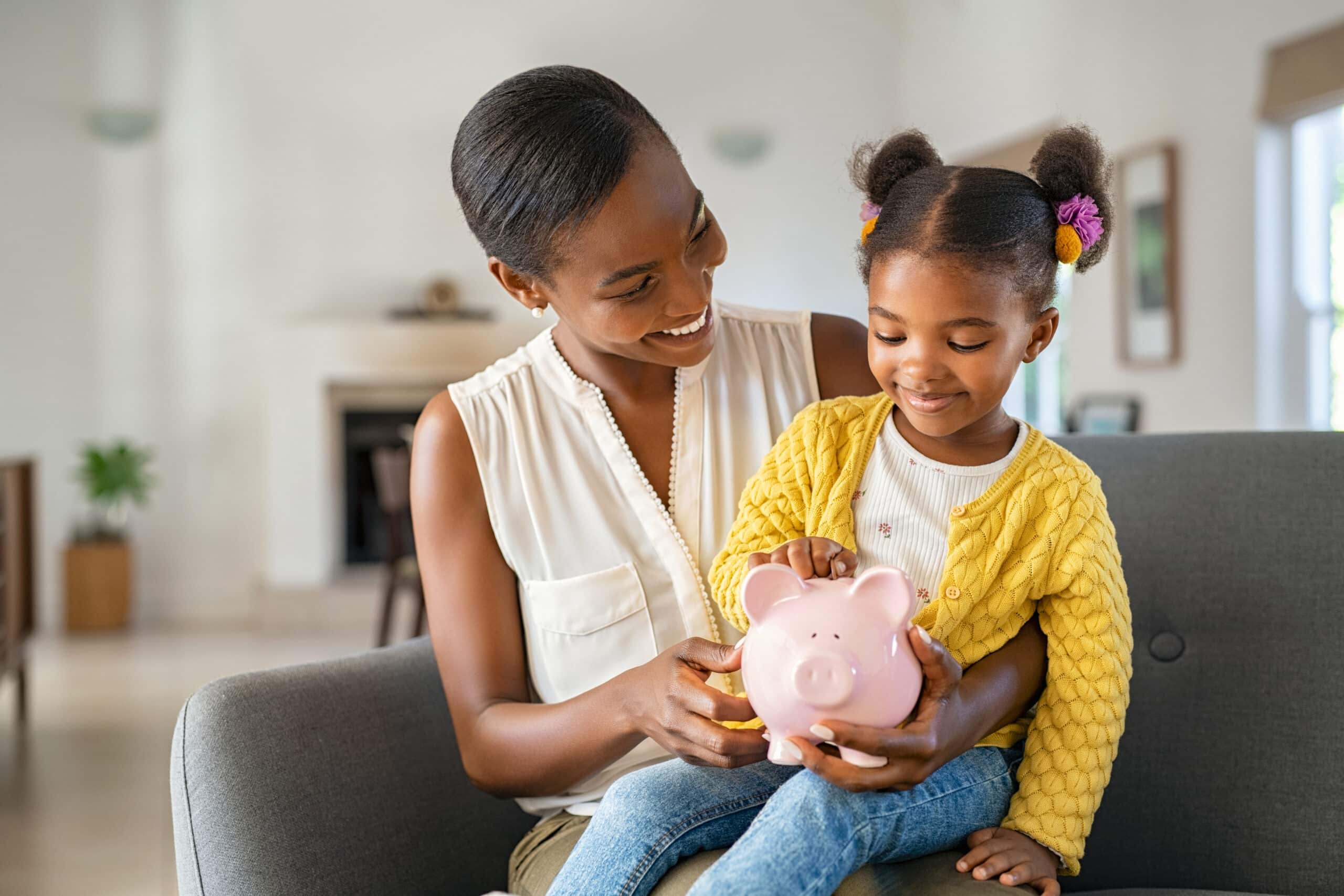 Help your child save. woman with daughter.