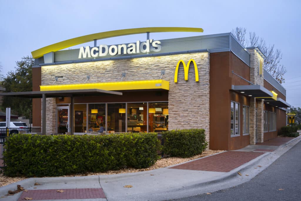 save at McDonald's—exterior picture of a new McDonald's.