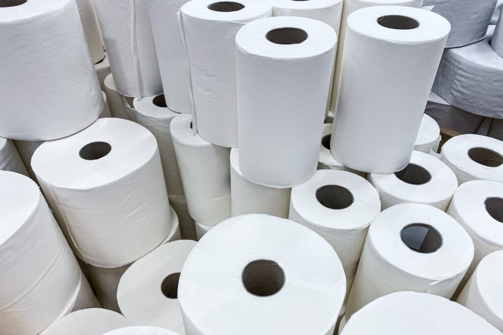 paper products. Stack of paper towels in rolls. Kitchen craft cleaning equipment