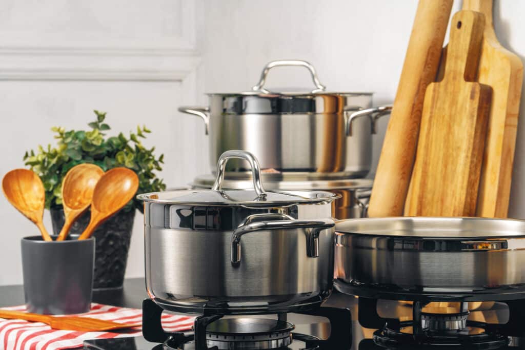 kitchen tools. Clean saucepan on a gas stove in kitchen. Close up.