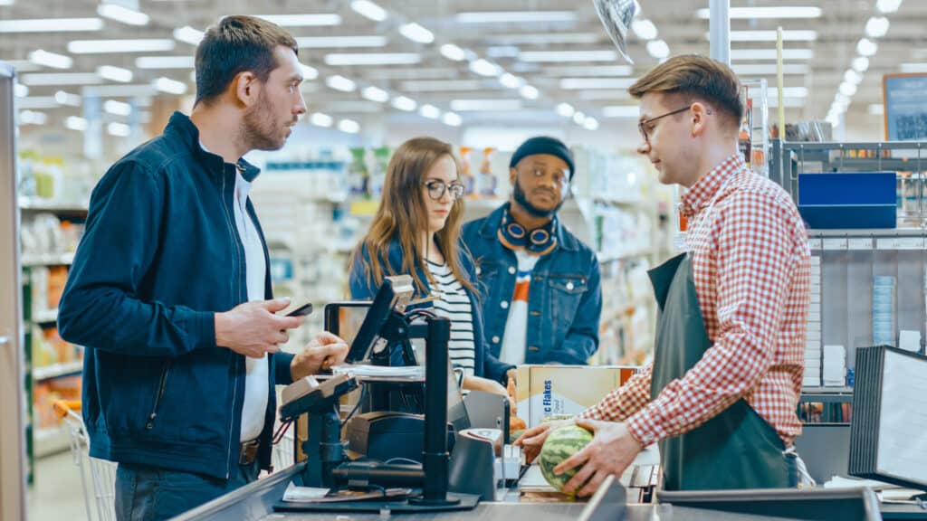 expenses that add up, people in checkout line