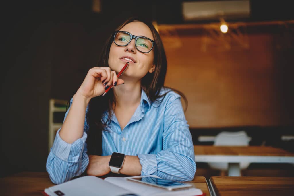 woman thinking about getting out of debt