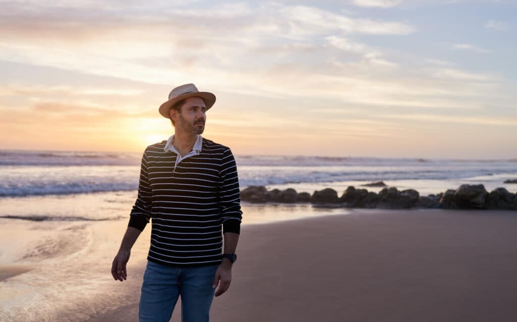 FIRE model man on beach